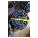 Roll of blue flat hose with couplers