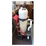 Portable pool pump. Mounted on a hand truck for