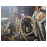 ROPES, HOSES ON FENCE