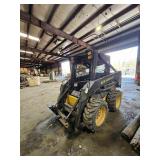 New Holland Model LS 170 Skid Steer, with bucket.