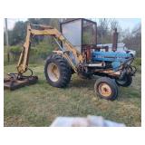 Ford 6610 With side arm nower.