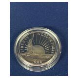 1986 Liberty Half Dollar, in case and cover
