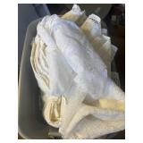 Tote of Decorative Tablecloths and Mats