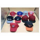 Ball Caps. Most Are Sports Themed.