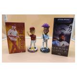 Two Bobble Head Dolls
