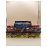 Five Diecast Matchbox Racecar Transporters