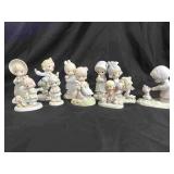 10 Precious Moment Figurines.
