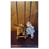 Porcelain Christmas Doll On Rocking Reindeer