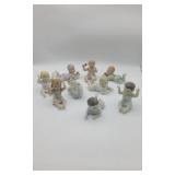 9 Unmarked Piano Babies.