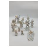 12 Precious Moment Figurines.