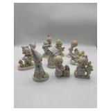10 Precious Moment Figurines.