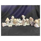 11 Precious Moment Figurines.