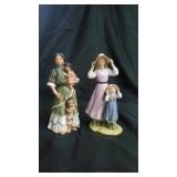 2 home inerior Porcelain Figurines.