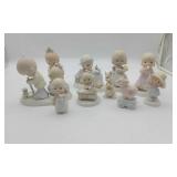 10 Precious Moment Figurines.