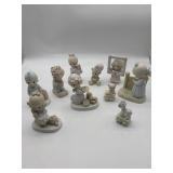 9 Precious Moment Figurines.