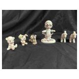 6 Precious Moment Figurines.
