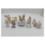 13 Precious Moment Figurines.