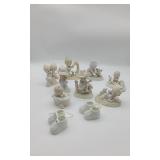 !0 Precious Moment Figurines.