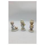 10 Precious Moment Figurines.
