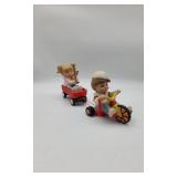 Hand Painted Ceramic Figurine Boy w/ Girl in wagon