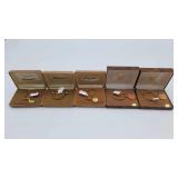 5 "Simmons" Gold-Toned Key Rings
