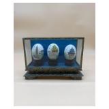 3 Chinese Hand Painted Eggs in Display Case