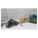 Box of Rope Lights and Extension Cords
