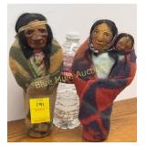 2 vintage M.F. Woods paper-mï¿½chï¿½ Skookum dolls