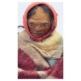 2 vintage M.F. Woods paper-mï¿½chï¿½ Skookum dolls