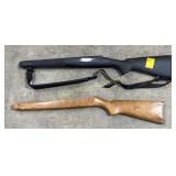 2 gun stocks, 1 wood, 1 synthetic