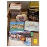 Assorted greeting cards, tins