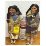 2 vintage plastic painted face Skookum dolls
