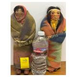 2 vintage M.F. Woods paper-mï¿½chï¿½ Skookum dolls