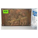 Brass embossed bullseye plaque