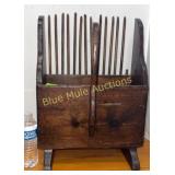 Antique Cranberry picker made into magazine