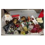 Christmas decorations, paper, ribbons in storage