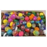 Lg box full of vending machine spinners