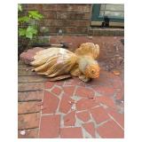 Concrete Fish on Front Steps of house.