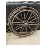 2 Primitive Wheelchair Wheels