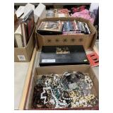 Assorted DVDs and Costume Jewelry