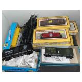 Assorted HO Train Cars and Track