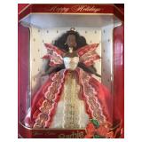 4 Collectible Barbies in Boxes