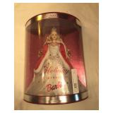 4 Collectible Barbies