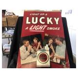 Cardboard Lucky Strike Advertisement