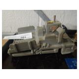 Iowa Manufacturing Co. Cast Metal Asphalt Paver