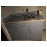 Wooden Cabinets with Formica Top and Sink