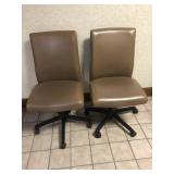 2 Tan Upholstered Adjustable Office Chairs