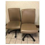 2 Tan Upholstered Adjustable Office Chairs