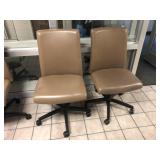 2 Tan Upholstered Adjustable Office Chairs