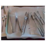(7) Tongs